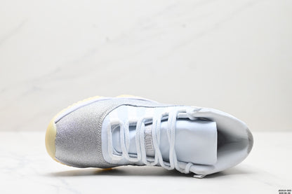 Nike Air Jordan 11 Retro High-Top Sneakers – White & Silver